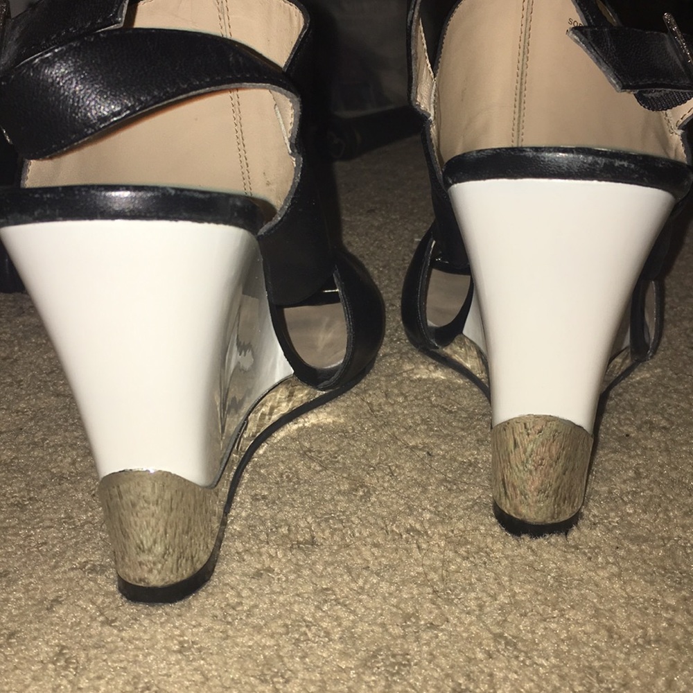 Black white and chrome mule wedges
